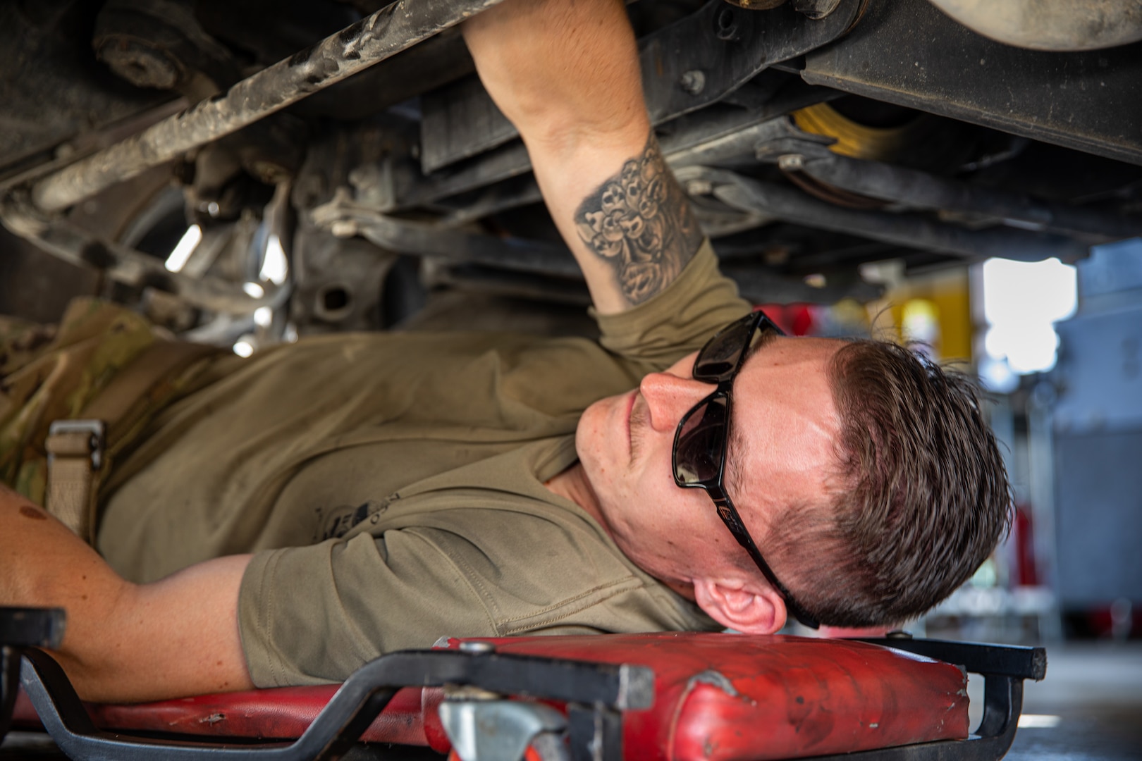 U.S. Army Spc. Josiah Davenport, assigned to the 269th Military Police Company, Tennessee National Guard conducts maintenance on a vehicle at Joint Base Anacostia-Bolling in Washington, D.C., Aug. 30, 2025. About 2,300 National Guard members are supporting the D.C. Safe and Beautiful mission providing critical support to the D.C. Metropolitan Police Department in ensuring the safety of all who live, work and visit the District.