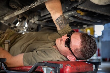 U.S. Army Spc. Josiah Davenport, assigned to the 269th Military Police Company, Tennessee National Guard conducts maintenance on a vehicle at Joint Base Anacostia-Bolling in Washington, D.C., Aug. 30, 2025. About 2,300 National Guard members are supporting the D.C. Safe and Beautiful mission providing critical support to the D.C. Metropolitan Police Department in ensuring the safety of all who live, work and visit the District.