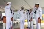 APRA HARBOR, Guam (Aug. 24, 2025) Cmdr. Ronald Jenkins, outgoing commanding officer of the Arleigh Burke-class guided-missile destroyer USS Higgins (DDG 76), salutes side boys during the Higgins change of command ceremony onboard Naval Base Guam, in Apra Harbor, Guam, Aug. 24. Higgins is forward-deployed and assigned to Destroyer Squadron (DESRON) 15, the Navy’s largest DESRON and the U.S. 7th Fleet’s principal surface force. (U.S. Navy photo by Mass Communication Specialist 2nd Class Trevor Hale)