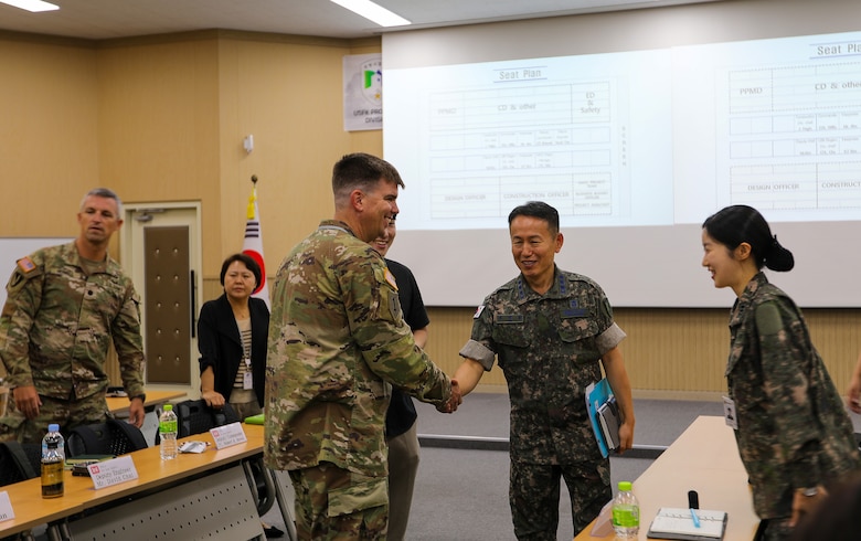 FED AND MND-DIA employees attend symposium to discuss military construction.