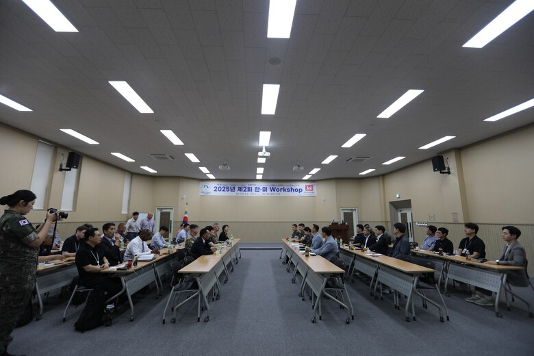 FED AND MND-DIA employees attend symposium to discuss military construction.