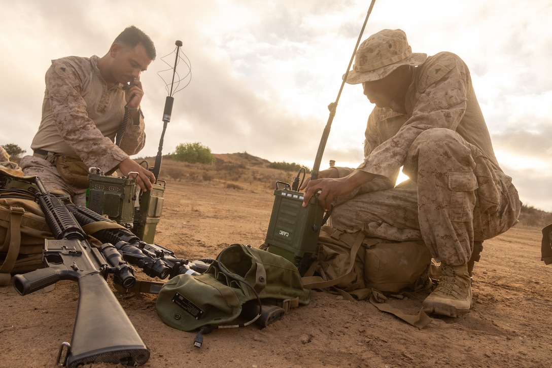 U.S. Marine Corps Cpl. Steele Armstrong, a satellite transmissions systems operator, and U.S. Marine Corps Lance Cpl. Jaden Coleman, a transmission systems operator, both with Marine
Wing Communications Squadron 18, Marine Air Control Group 18, 1st Marine Aircraft Wing,

set up a radio call during the inaugural Thunderstruck Communications Competition, hosted by

MWCS-38, MACG-38, 3rd MAW, at Marine Corps Air Station Miramar, California, Sept. 10,

2025