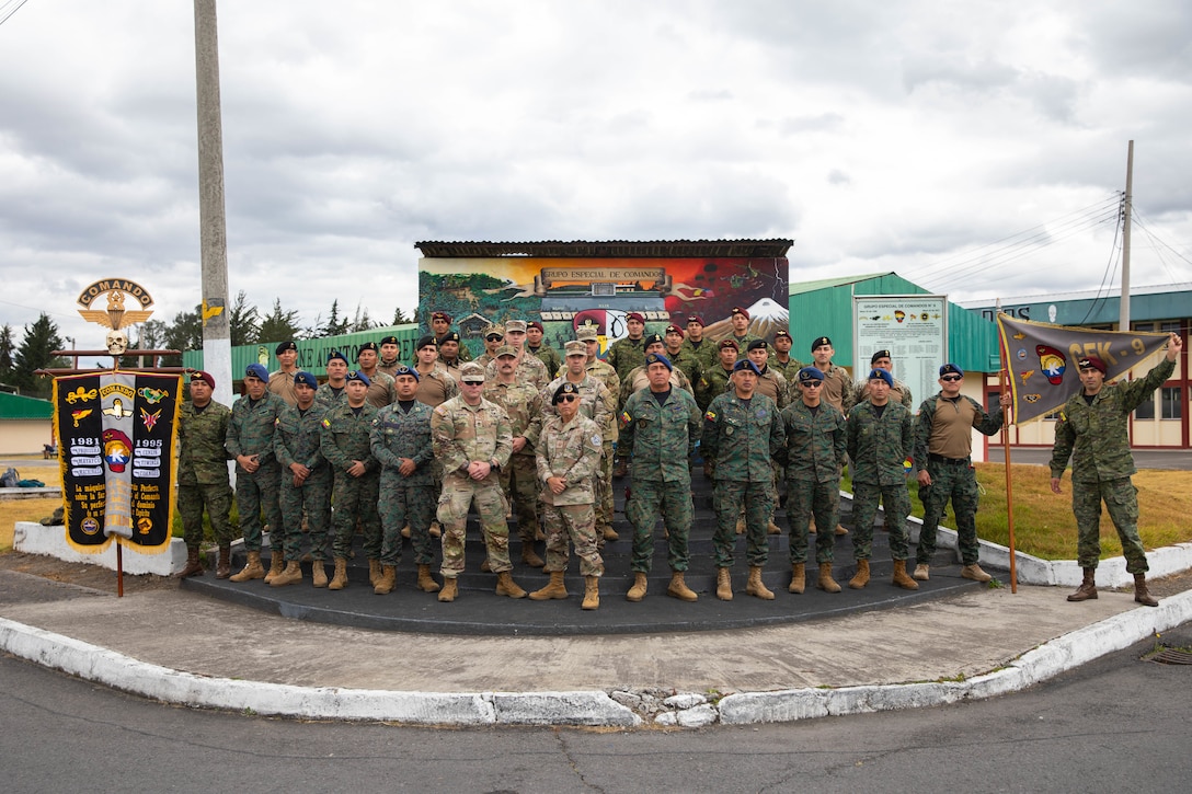 Soldiers and Airmen of the Kentucky National Guard and servicemembers of the Ecuadorian 9th Special Forces Brigade pose for a photo at the conclusion of an air assault planning exchange in Latacunga, Ecuador, Aug. 21, 2025.