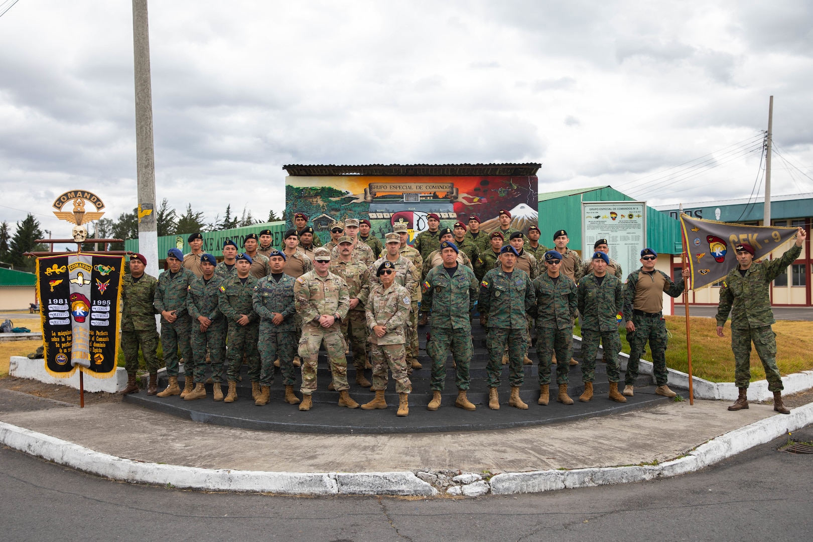 Soldiers and Airmen of the Kentucky National Guard and servicemembers of the Ecuadorian 9th Special Forces Brigade pose for a photo at the conclusion of an air assault planning exchange in Latacunga, Ecuador, Aug. 21, 2025.