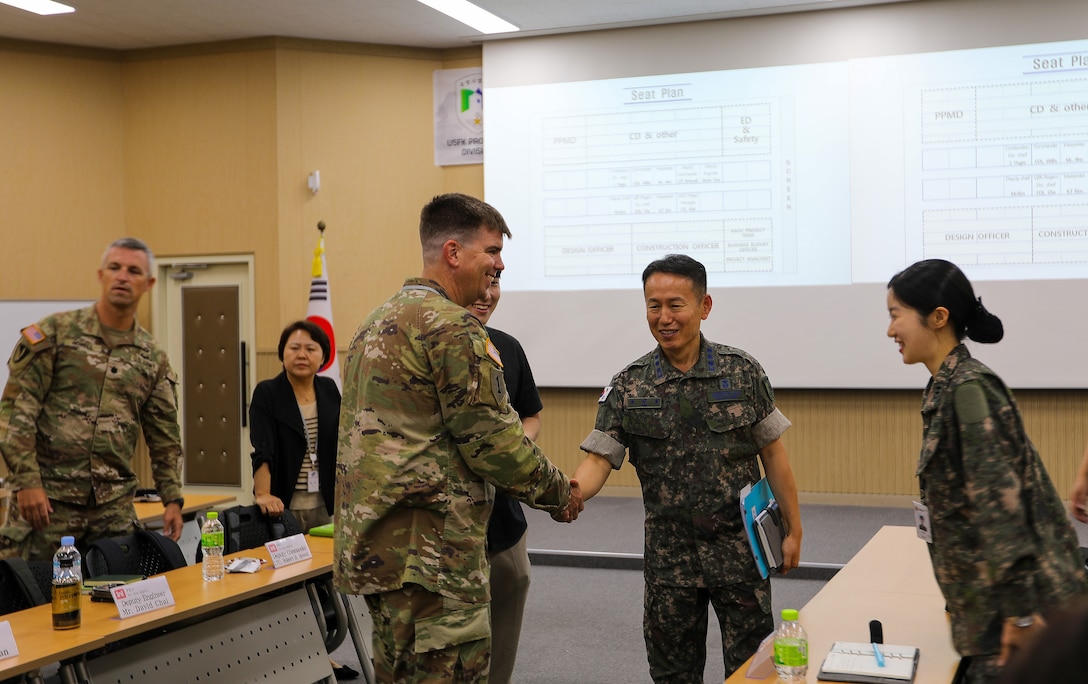 FED AND MND-DIA employees attend symposium to discuss military construction.