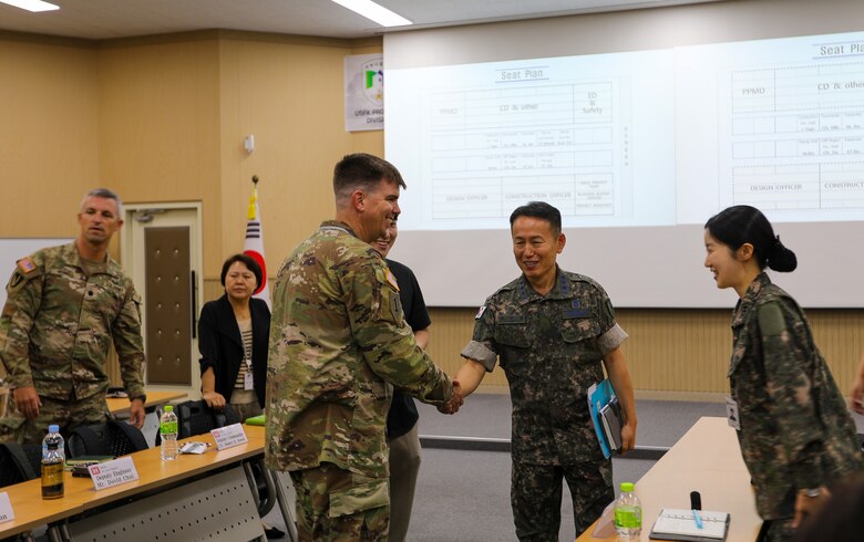 FED AND MND-DIA employees attend symposium to discuss military construction.