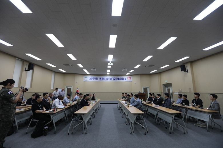 FED AND MND-DIA employees attend symposium to discuss military construction.