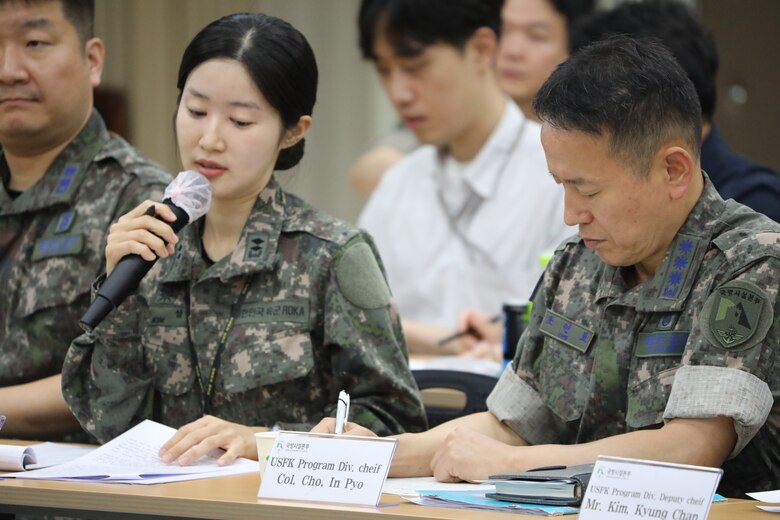 FED AND MND-DIA employees attend symposium to discuss military construction.