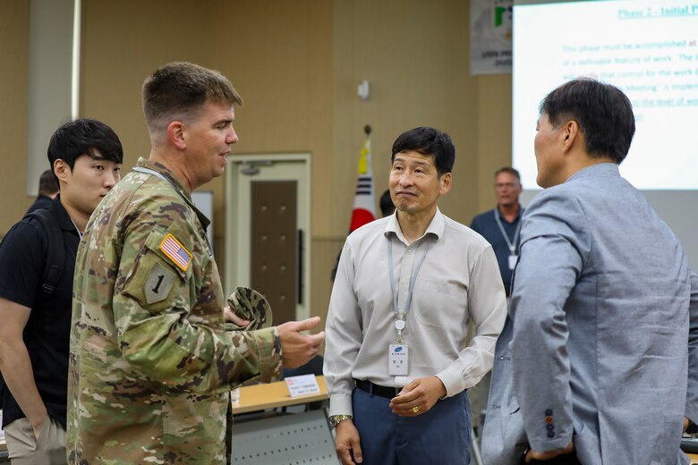 FED AND MND-DIA employees attend symposium to discuss military construction.