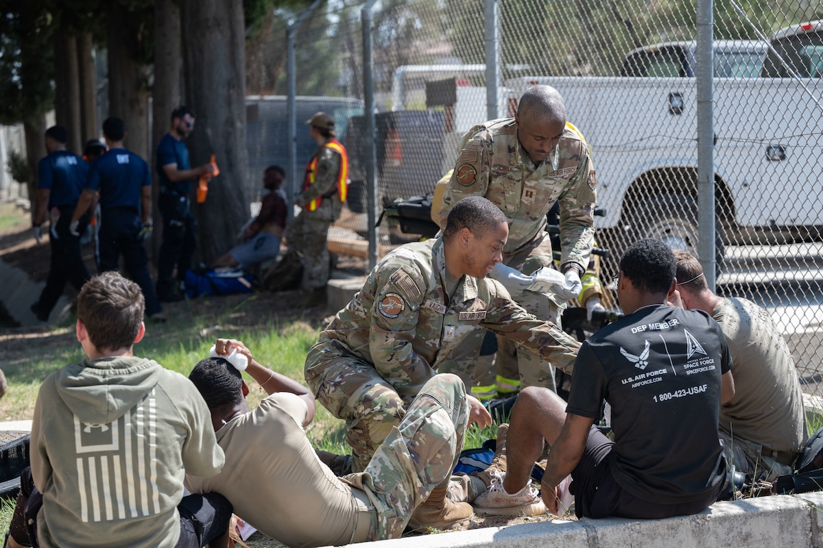 39th Medical Group Airmen render aid to casualties during Exercise Titan Shield 25-09 at Incirlik Air Base, Türkiye, Sept. 10, 2025. The mass casualty portion of the exercise tested Airmen’s ability to deliver fast, coordinated care under pressure, demonstrating their readiness to support the mission during crisis conditions. (U.S. Air Force photo by Senior Airman Greydon Furstenau)