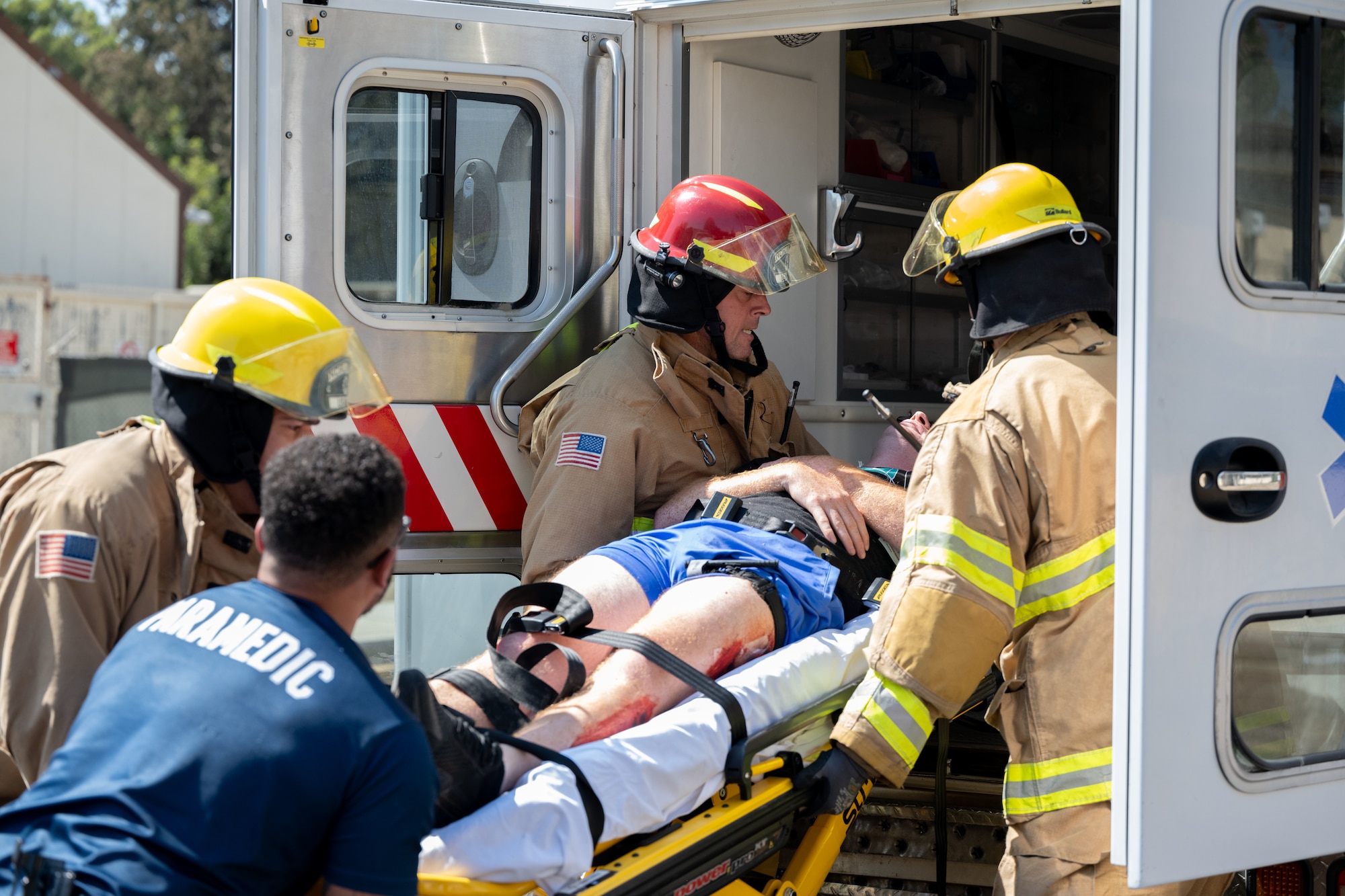 39th Air Base Wing emergency responders, transport a casualty into an ambulance during Exercise Titan Shield 25-09 at Incirlik Air Base, Türkiye, Sept. 10, 2025. The mass casualty portion of the exercise tested Airmen’s ability to deliver fast, coordinated care under pressure, demonstrating their readiness to support the mission during crisis conditions. (U.S. Air Force photo by Senior Airman Greydon Furstenau)