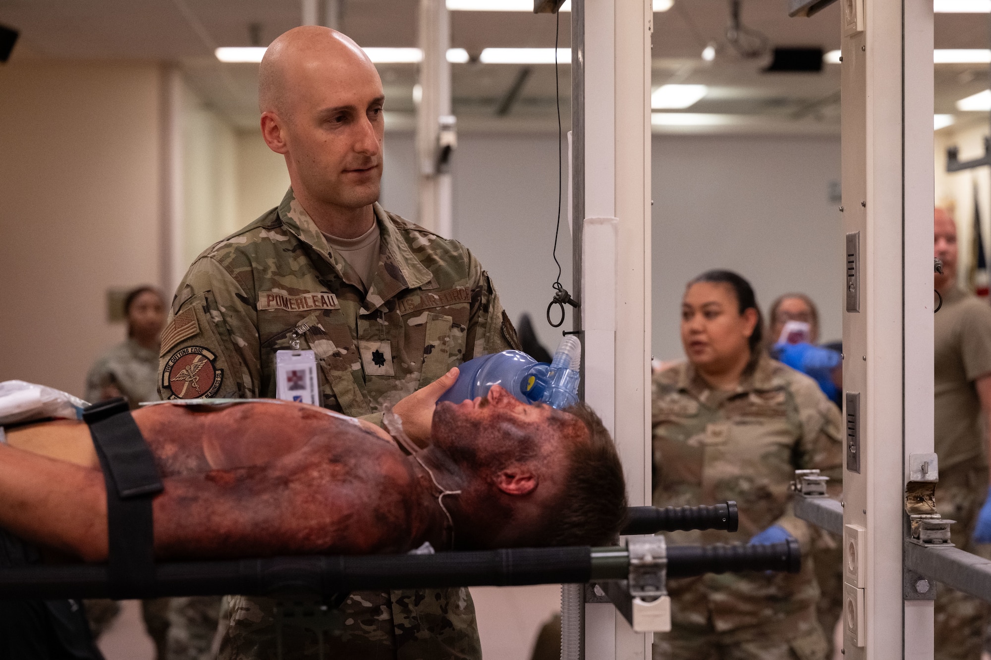U.S. Air Force Lt. Col Mark Pomerleau, 39th Medical Group flight commander of education and training, treats a patient during Exercise Titan Shield 25-09 at Incirlik Air Base, Türkiye, Sept. 10, 2025. The mass casualty portion of the exercise tested Airmen’s ability to deliver fast, coordinated care under pressure, demonstrating their readiness to support the mission during crisis conditions. (U.S. Air Force photo by Senior Airman Greydon Furstenau)