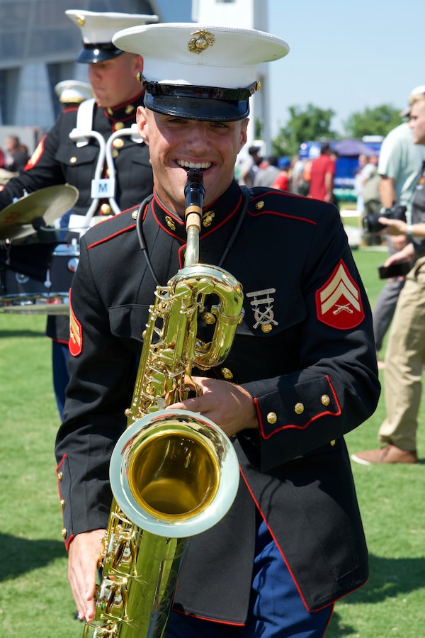 U.S. Marine Corps Cpl. David Zehrung, a saxophone instrumentalist with the 2nd Marine Aircraft Wing Band, brass band, assigned to Special Purpose Marine Air-Ground Task Force-250 performs at the static display during Marine Week Atlanta, Aug. 31, 2025. Marines stationed across the globe commemorate the 250th anniversary of the Marine Corps, honoring a distinguished legacy of service, sacrifice, and unwavering fidelity to both the nation and the Corps. (U.S. Marine Corps photo by Staff Sgt. Matthew Booth)