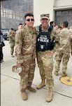 Two Soldiers stand facing the camera