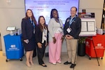 The National Capital Region Pain Initiative Program Office team poses at the annual Pain Care Skills Training and Substance Use Disorder Care event in Washington, D.C. The training promotes readiness, restoration of function and relief of pain, while reducing the misuse of opioids. (DOD photo by Roan Smith)