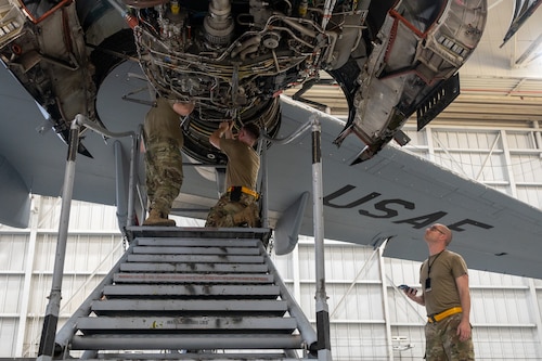 Air Force aircraft maintainers work on A C-17 Globemaster III Engine.