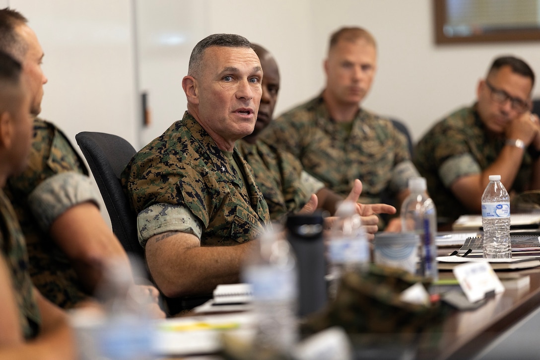 U.S. Marine Corps Brig. Gen. Ralph Rizzo Jr., commanding general of Marine Corps Installations East and Marine Corps Base Camp Lejeune, speaks to regional commanders and sergeants major Sept. 9, 2025, during the MCIEAST fall commander’s conference at Marine Corps Support Facility Blount Island in Jacksonville, Florida. Rizzo emphasized the importance of aligning regional priorities and exposing leaders to Blount Island’s unique sustainment mission. (U.S. Marine Corps photo by Dustin Senger)
