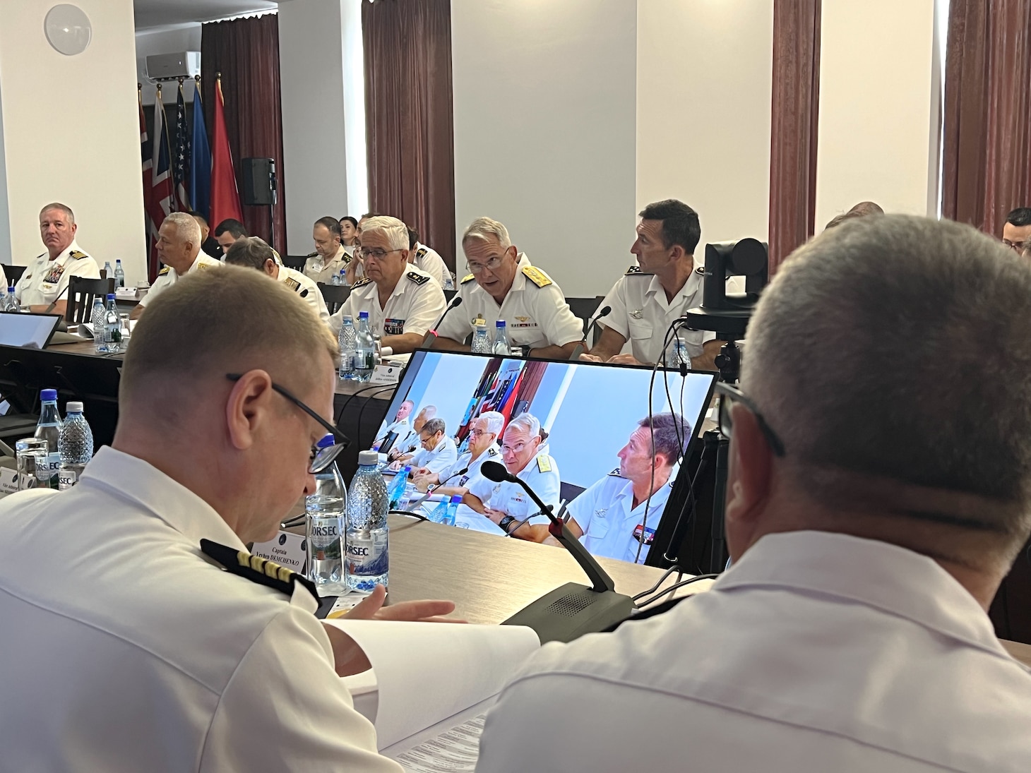 Vice Adm. J.T. Anderson (center) speaks during the Sea Breeze 25-3 Fleet Commander’s Conference, Sept. 11, 2025.