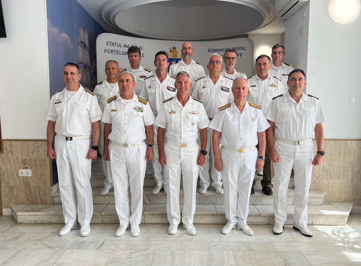 Vice Adm. J.T. Anderson (center) poses for a photo with naval representatives from Bulgaria, Estonia, France, Greece, Italy, Latvia, Norway, Romania, Sweden, Türkiye, Ukraine, U.K. at the Fleet Commander’s Conference, Sept. 11, 2025.
