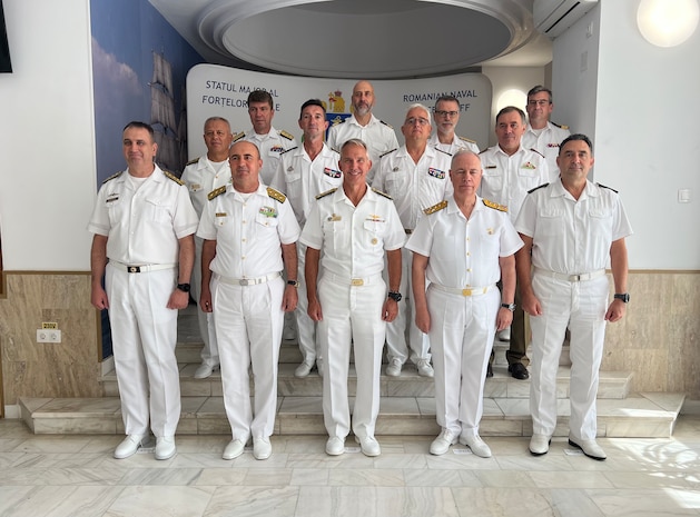 Vice Adm. J.T. Anderson (center) poses for a photo with naval representatives from Bulgaria, Estonia, France, Greece, Italy, Latvia, Norway, Romania, Sweden, Türkiye, Ukraine, U.K. at the Fleet Commander’s Conference, Sept. 11, 2025.