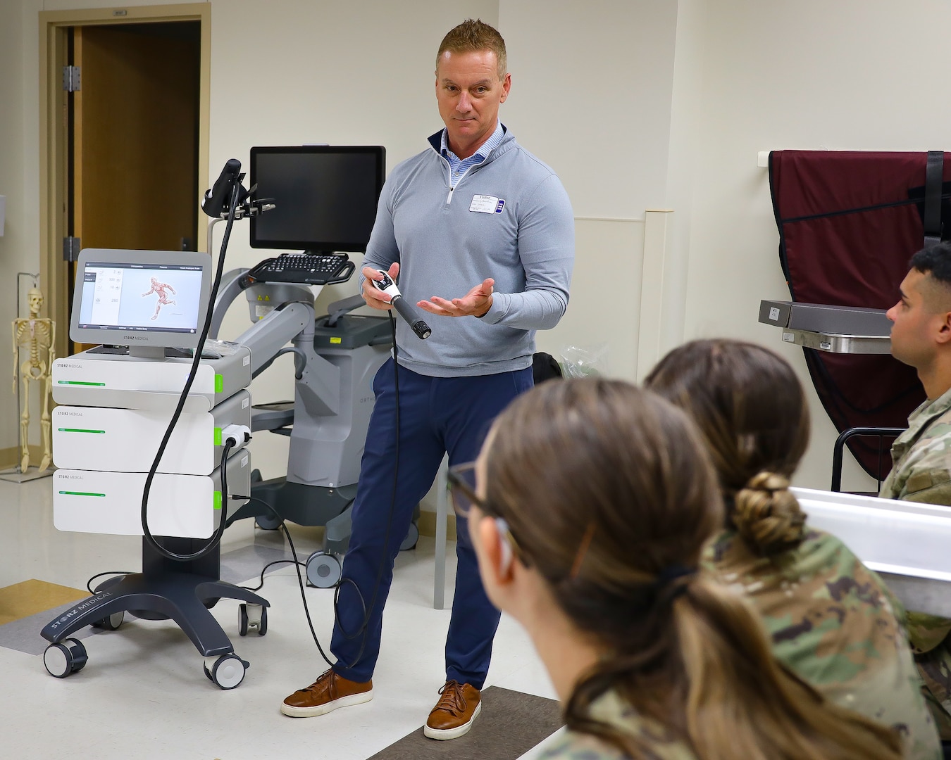Trainees watch a live demonstration showing how focused shockwave therapy stimulates new blood flow, releases growth factors and dissolves calcium deposits to speed healing and reduce pain. This technology will transform care for overuse injuries at Irwin Army Community Hospital.