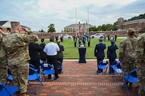 Members of the 11th Wing salute for the presentation of the colors and singing of the national anthem during a 9/11 remembrance ceremony at Joint Base Anacostia-Bolling, Washington, D.C., Sep. 11, 2025.