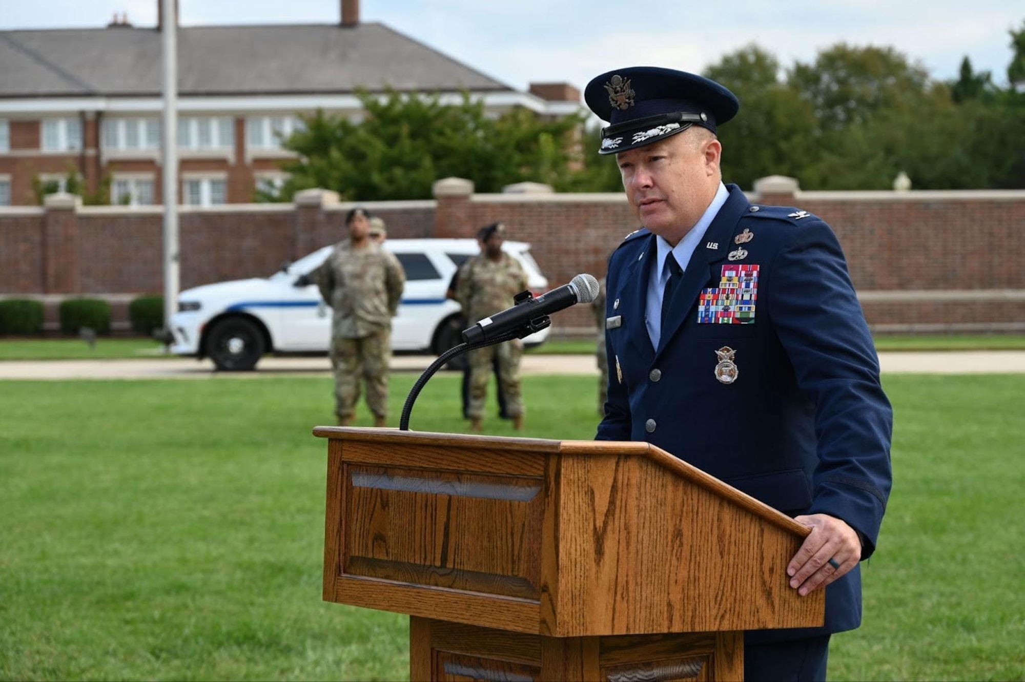 U.S. Air Force Col. James M. Clark, commander of Joint Base Anacostia-Bolling and the 11th Wing, introduces the guest speaker for the 9/11 remembrance ceremony at Joint Base Anacostia-Bolling, Washington, D.C., Sep. 11, 2025.