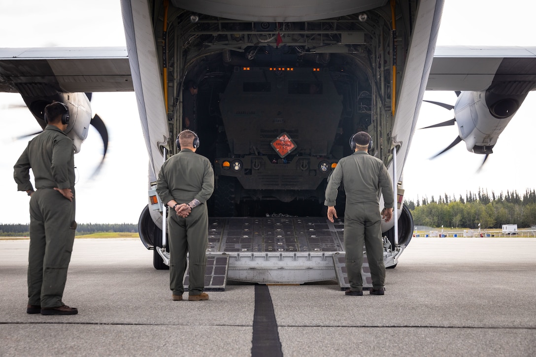 Marines with Marine Aerial Refueler Squadron 234 (VMGR-234), Marine Aircraft Group 41, 4th Marine Aircraft Wing, offload a High Mobility Artillery Rocket System (HIMARS) during ARCTIC EDGE 2025 (AE25) at Fort Greenly, Alaska, Aug. 22, 2025. Specialized Arctic training generates valuable lessons learned for warfighters and enablers ensuring they can execute their assigned missions in any environment. AE25 is a NORAD and U.S. Northern Command-led homeland defense exercise designed to improve readiness, demonstrate capabilities and enhance Joint and Allied Force interoperability in the Arctic. (U.S. Marine Corps Photo by Lance Cpl. Edward Spears.)