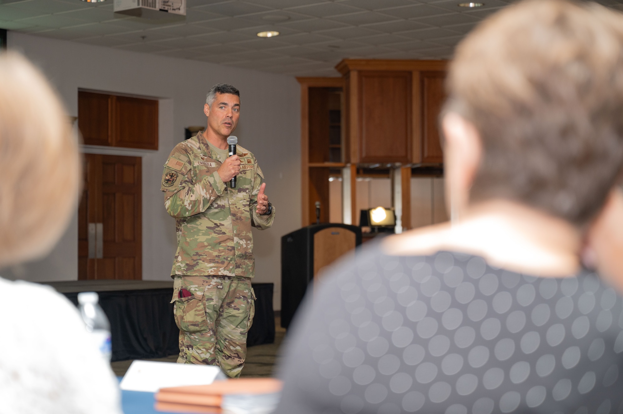 U.S. Air Force Col. Jose Cabrera, 355th Wing commander, kicks off the Arizona Commanders Summit at Davis-Monthan Air Force Base, Arizona, September 9, 2025. The ACS provides an opportunity for military commanders and Arizona community leaders to discuss topics impacting military installations. (U.S. Air Force photo by Airman Jaden Kidd)