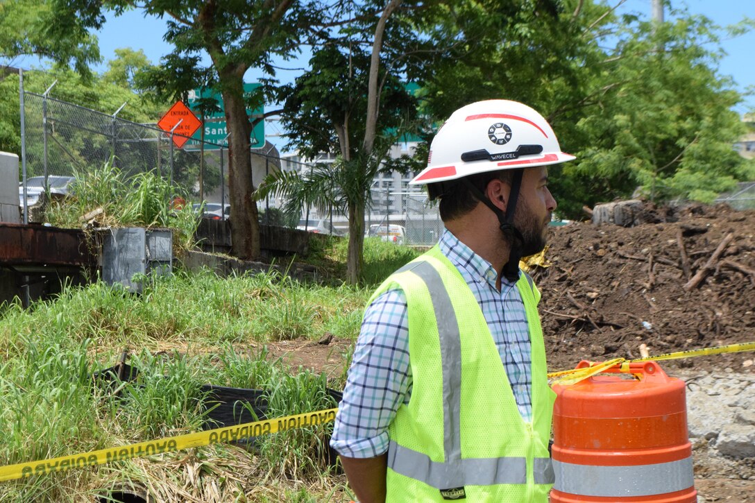 Jorge Rivera-Cruz, Structural Engineer & Technical Lead in the Engineering Division, Caribbean District stands in observation during a Caño Martín Peña Ecosystem Restoration Project site visit