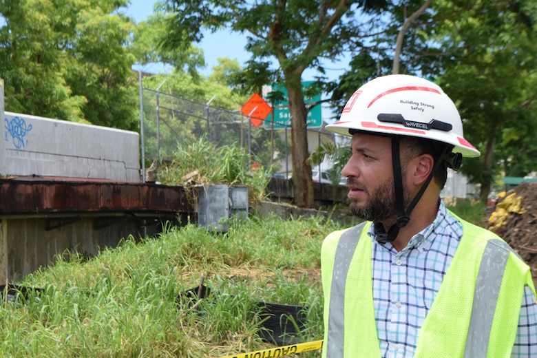 Jorge Rivera-Cruz, Structural Engineer & Technical Lead in the Engineering Division, Caribbean District stands in observation during a Caño Martín Peña Ecosystem Restoration Project site visit