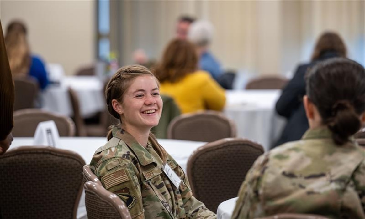 Attendees of the Wright-Patt Junior Force Council Annual Leadership Symposium interact with base agencies to gain an understanding of their operations on Sept. 4, 2025, at Wright-Patterson Air Force Base, Ohio. The council focuses on developing Air Force leaders through professional development, leadership, service, and networking opportunities. (U.S. Air Force photo by Jack Gardner)