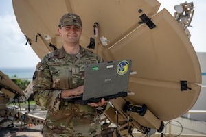 U.S. Air Force Warrant Officer Luke Ingram, a war fighter communications and information technology systems operations warrant officer, Puerto Rico Air National Guard, poses for an environmental portrait at Punta Salinas Air National Guard Station, Toa Baja, Puerto Rico, Aug. 21, 2025. Ingram, became the first warrant officer in the PRANG since the program reopened. (US. Air National Guard photo by Senior Airman Gisselle Toro Caraballo)