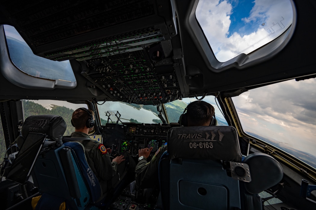 Airmen pilot a C-17