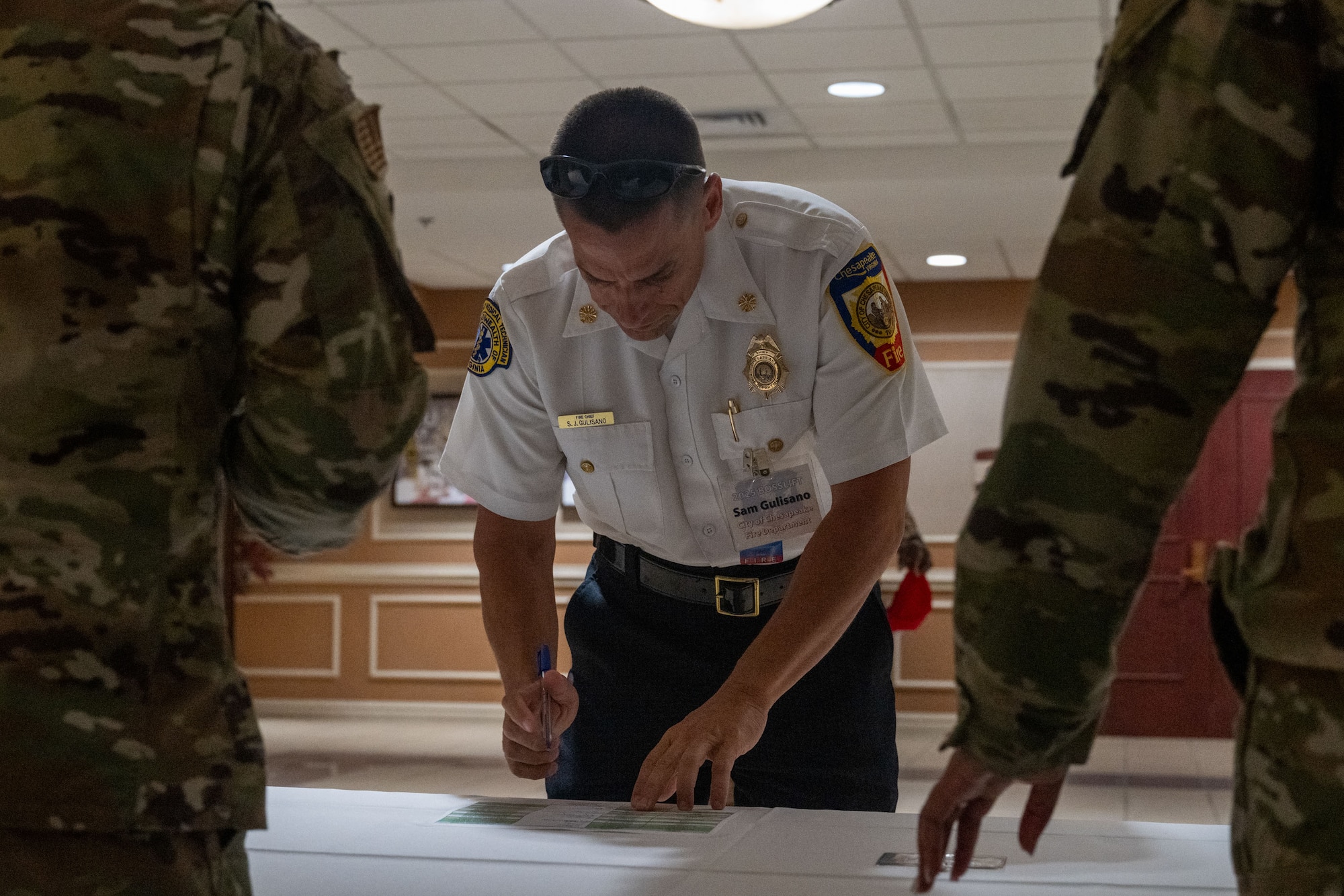 Fire Chief Gulisano signing in to an event