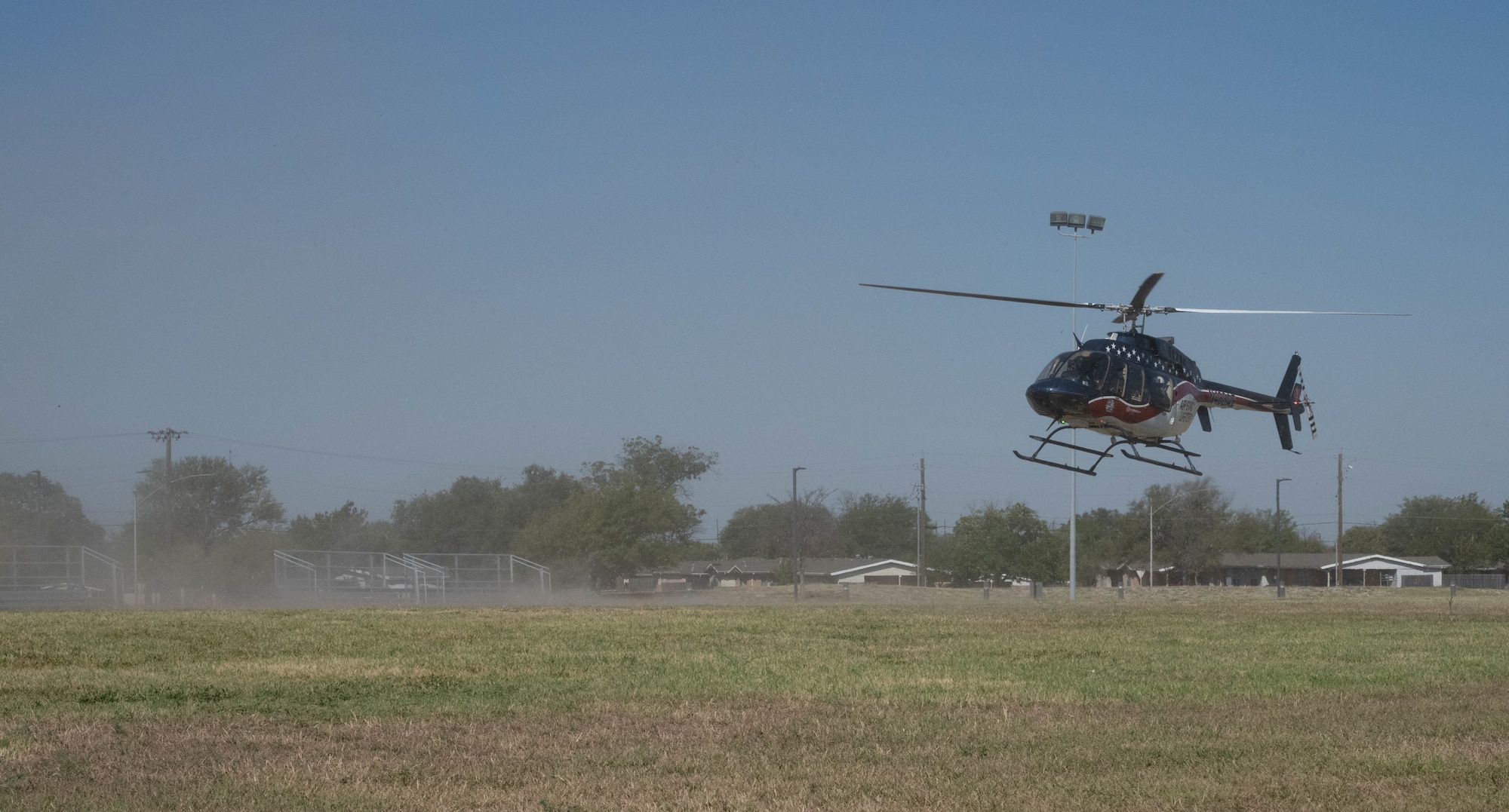 A Val Verde Regional Medical Center helicopter prepares to land during an active shooter exercise at Laughlin Air Force Base, Texas, Sept. 4, 2025.  This was the first time air medical evacuation response from the local area participated in a base exercise. (U.S. Air Force photo by Airman 1st Class Darryl Keith.)