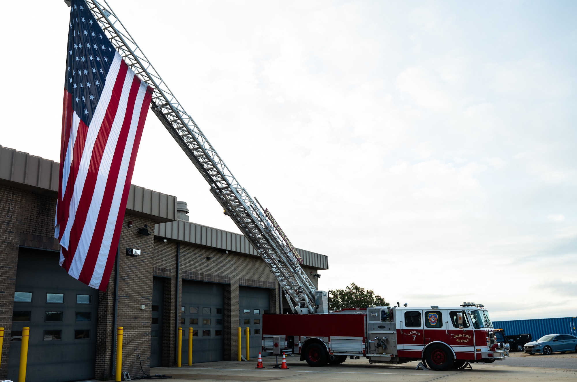 A fire truck displays the American Flag during a 9/11 memorial ceremony