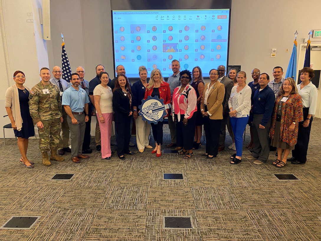 A group photo from the OI Board's 2025 summit.
