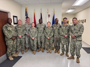 Pictured from left to right are: Lt. Cmdr. Fred Nti, FMMTC Logistics Instructor, Lt. Cmdr. Jason Kouche, NMRLC Director, Expeditionary Medical Logistics, Lt. Matthew Chase, Loggie Track, NMRTC Beaufort, SC, LT Brittany Brooks, Comptroller Track, NMRTC Okinawa, Japan, Cmdr. Olusegun Olabode, NMRLC Executive Officer, Lt. Tenzin Pema, Loggie Track, 2D MED BN, Camp Lejeune, NC, Lt. Cmdr. Ato Anderson, FMMTC Comptroller Instructor, Lt. Eric Hetzel, Comptroller Track, NMRTC Bethesda, MD, and Ltjg. Morrison Aung, Comptroller Track, NMRTC Camp Pendleton, CA.
