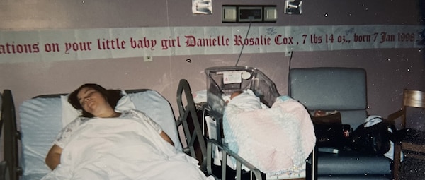 Lt. Danielle Acosta (baby in bassinet) with mom, Tina Cox, in the L&D unit at Naval Hospital Jacksonville, January 1998. Acosta currently serves a nurse in the same unit and just delivered her daughter here last month.