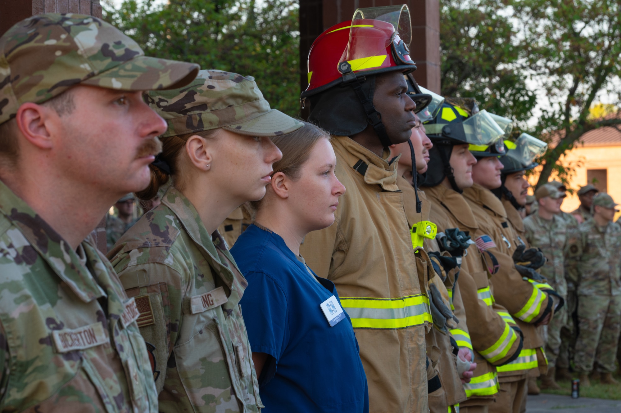 U.S. Airmen stand in attendance for a 9/11 remembrance ceremony at Whiteman Air Force Base, Missouri, Sept. 11, 2025. Members from several units on base gathered to honor those who lost their lives during the attack on Sept. 11, 2001. (U.S. Air Force photo by Senior Airman Joseph Garcia)