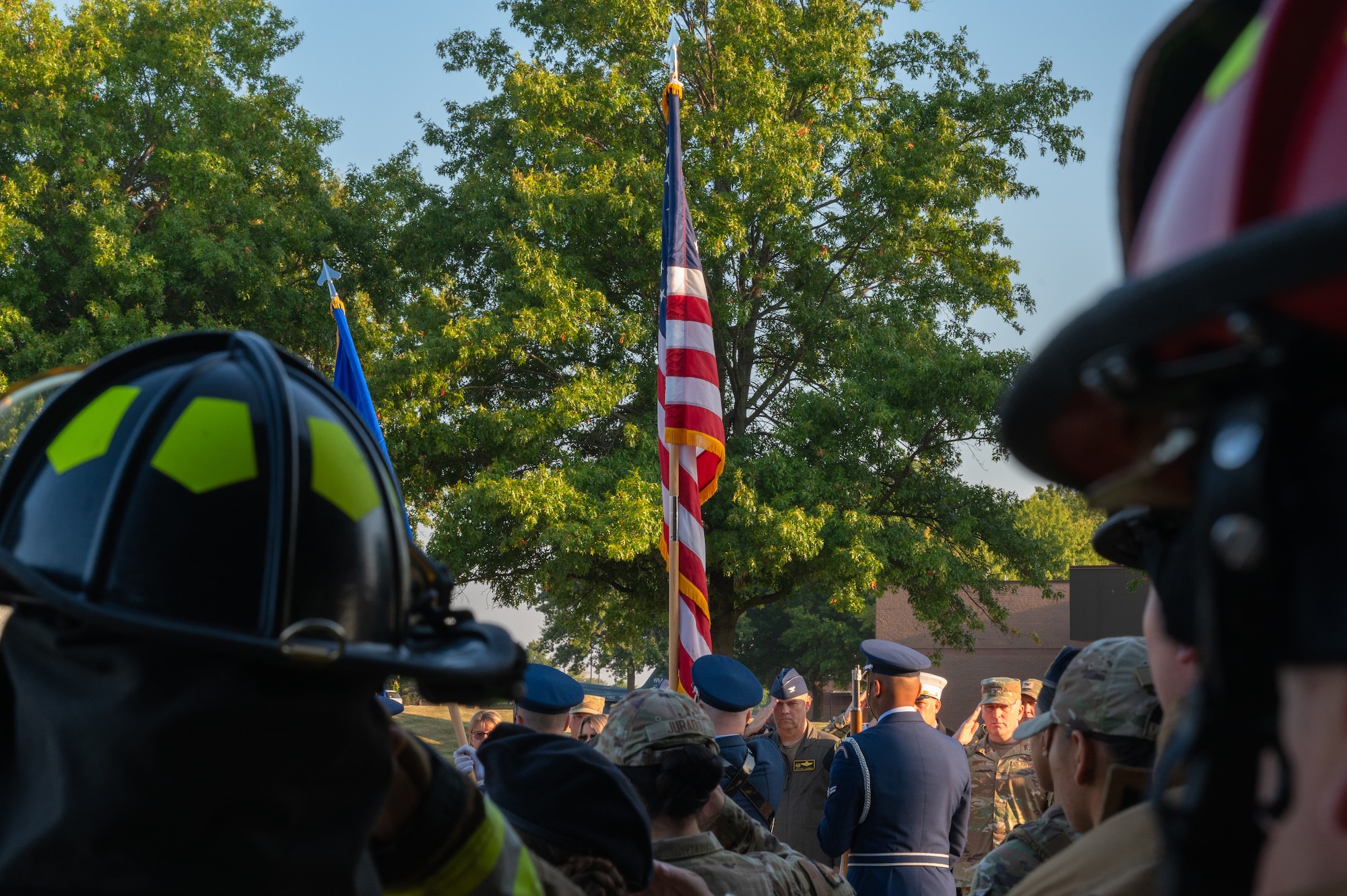 Base honor guardsmen assigned to the 509th Force Support Squadron raise a U.S. flag during a 9/11 remembrance ceremony at Whiteman Air Force Base, Missouri, Sept. 11, 2025. The ceremony commemorated those who lost their lives during the attack on Sept. 11, 2001. (U.S. Air Force photo by Senior Airman Joseph Garcia)