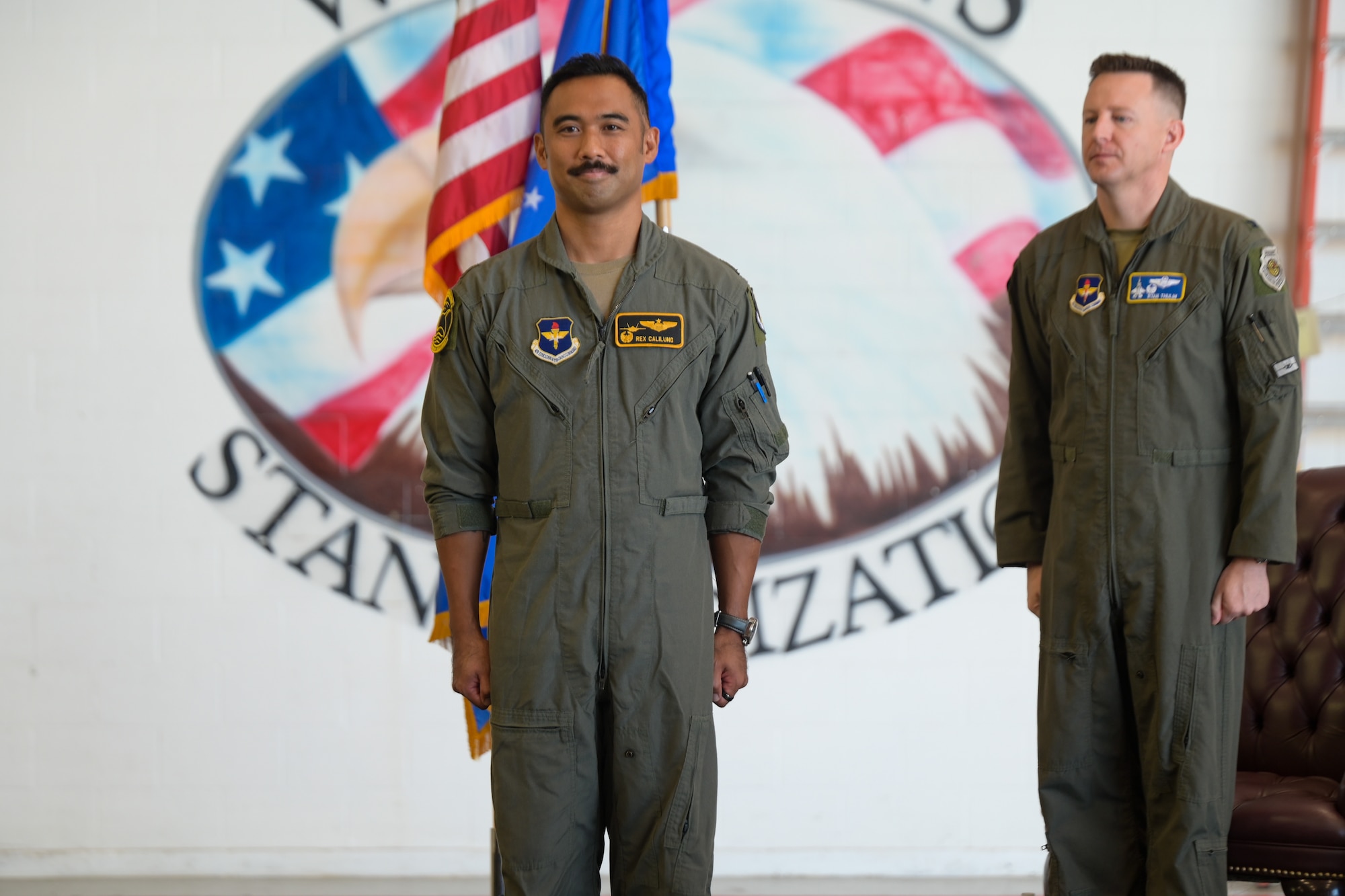 A photo of airmen at attention.