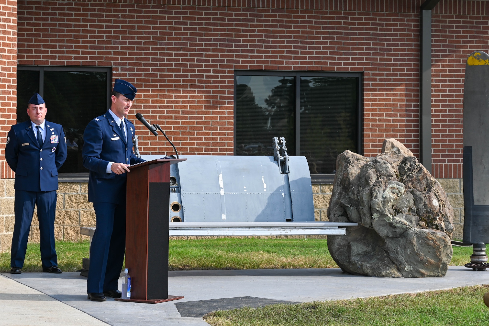 A service member gives a speech.