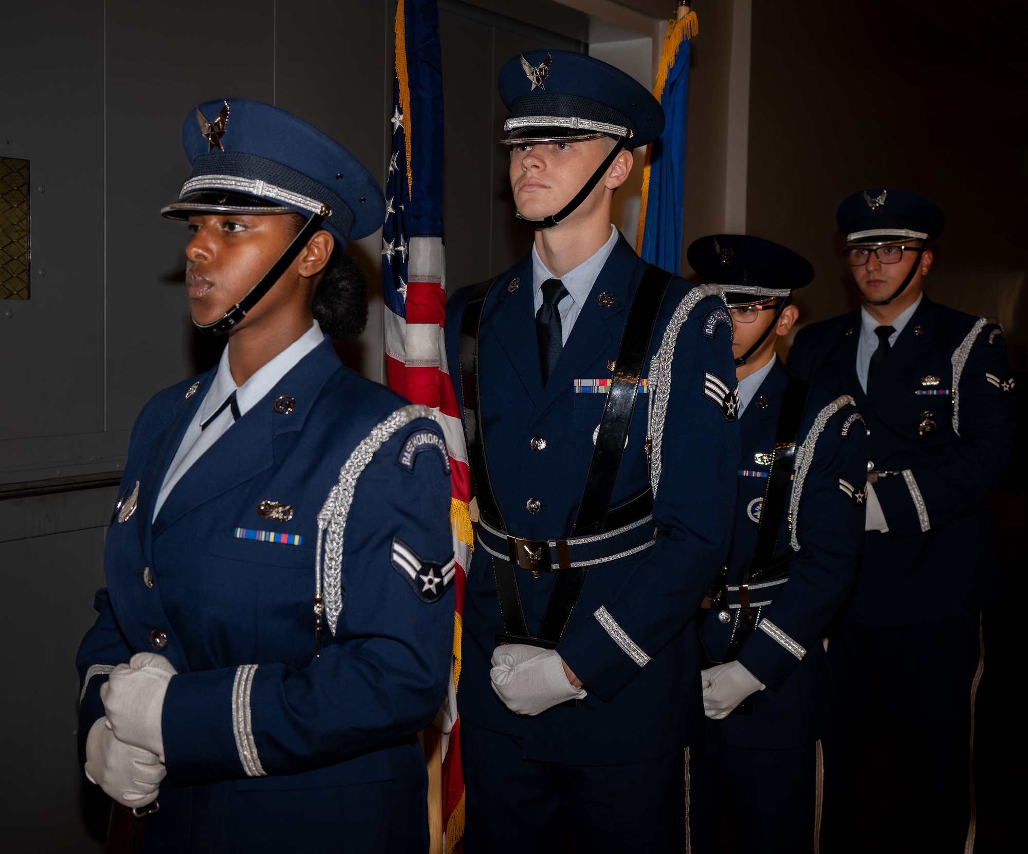 Uniformed personnel stands at attention