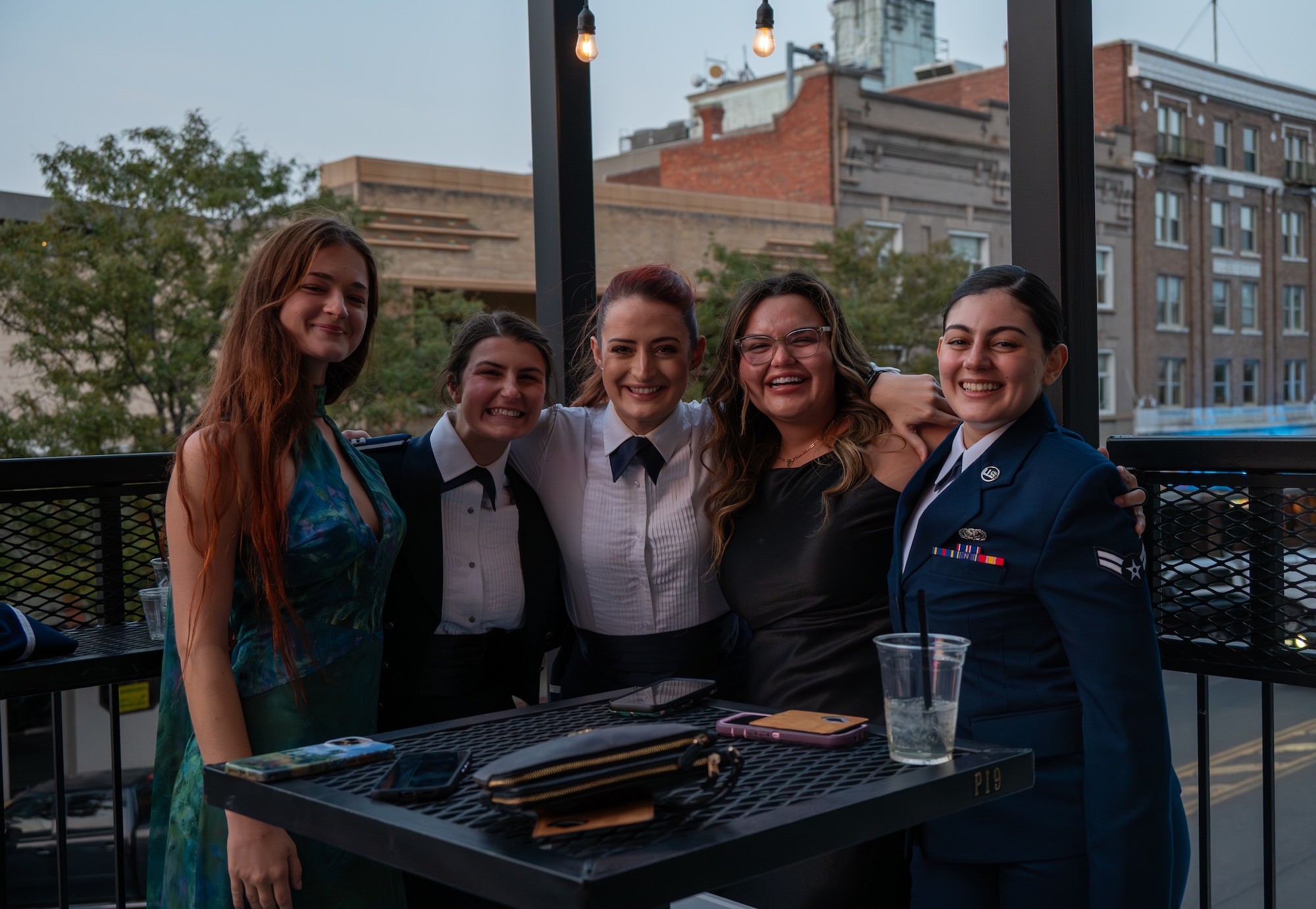 A group of women pose for a photo