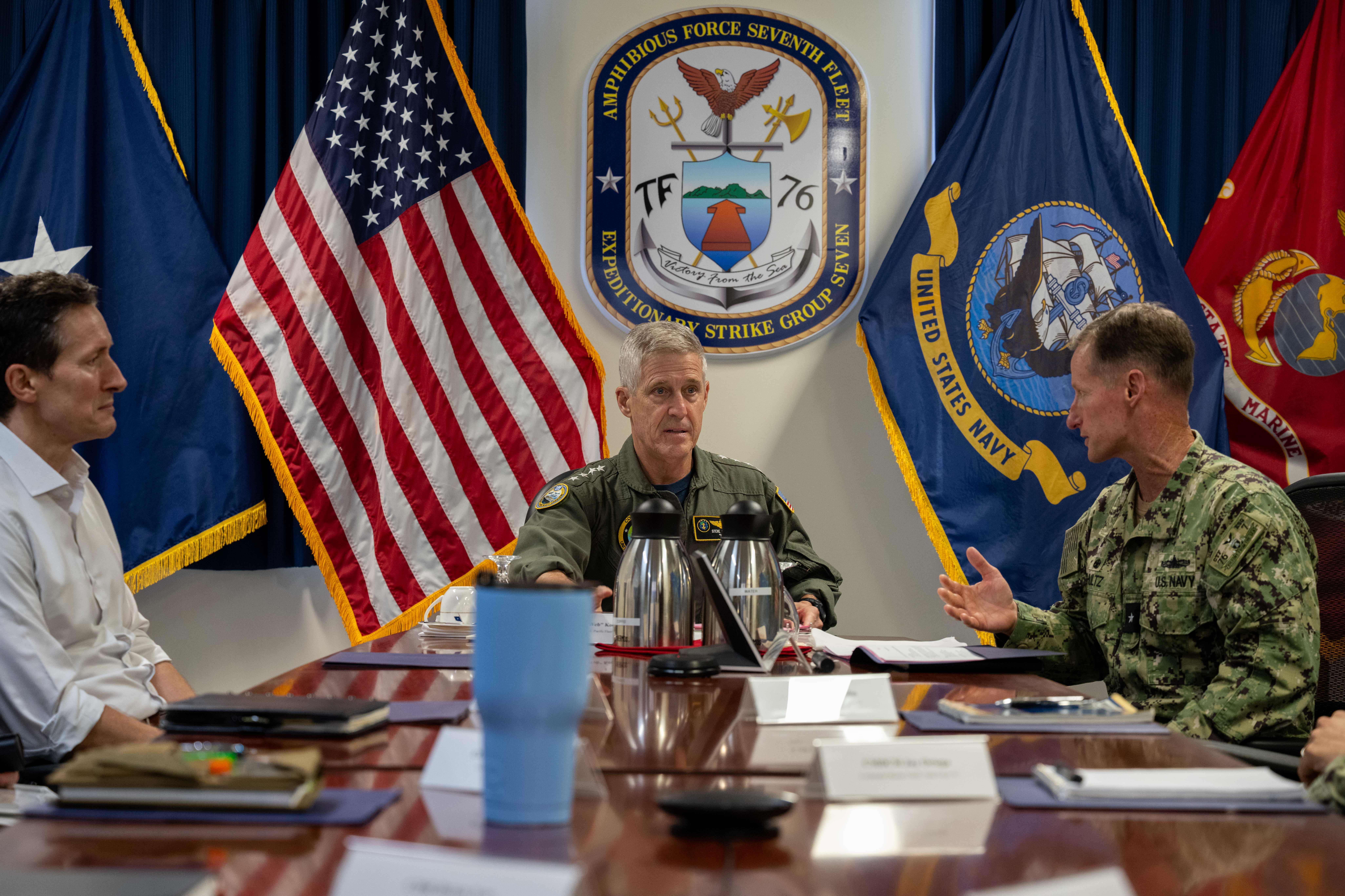 OKINAWA, Japan (Sept. 10, 2025) Rear Adm. Tom Shultz, commander, Task Force (CTF) 76, right, briefs Adm. Steve Koehler, commander, U.S. Pacific Fleet, center, on command operations during Koehler’s visit to CTF 76 on White Beach Naval Facility, Okinawa, Sept. 10. Koehler’s visit to Okinawa underscored the Pacific Fleet’s commitment to integrated maritime operations alongside the U.S. Marine Corps and highlighted ongoing efforts to strengthen forward-deployed readiness, joint force interoperability, and regional partnerships in support of a free and open Indo-Pacific. Within the U.S. 7th Fleet area of operations, CTF 76 is responsible for conducting expeditionary warfare operations with Navy and Marine Corps capabilities to support theater contingencies that range from crisis response to full combat operations. (U.S. Navy photo by Mass Communication Specialist 2nd Class Danilo Reynoso)