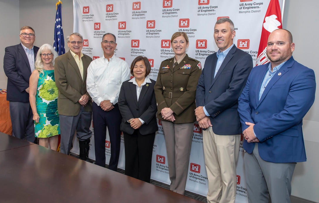 Group of people positioned for a photo