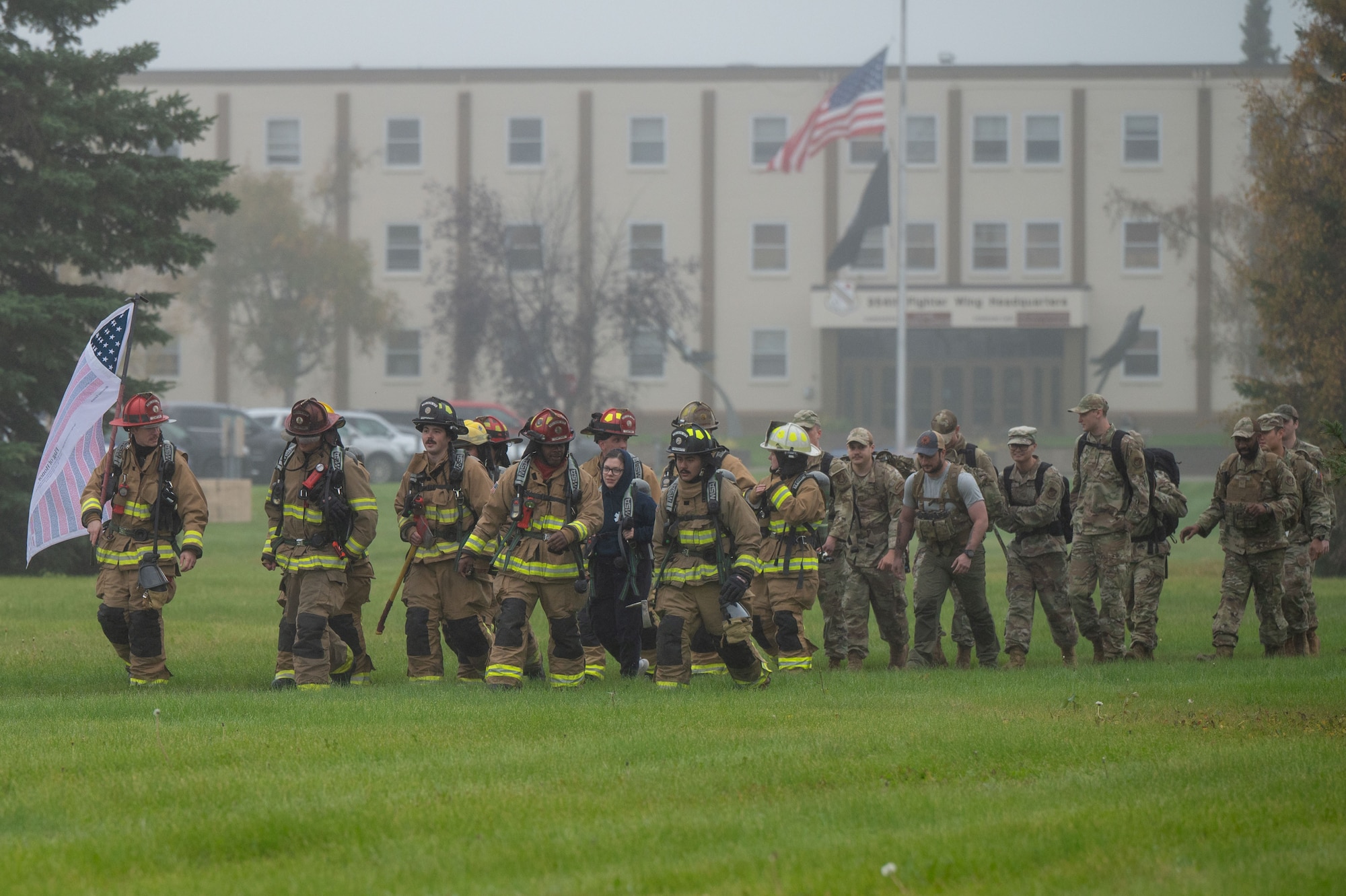 Airmen from the 354th Civil Engineer Squadron participate in a two-mile ruck following the 24th annual 9/11 Remembrance Ceremony at Eielson Air Force Base, Alaska, Sept. 11, 2025.