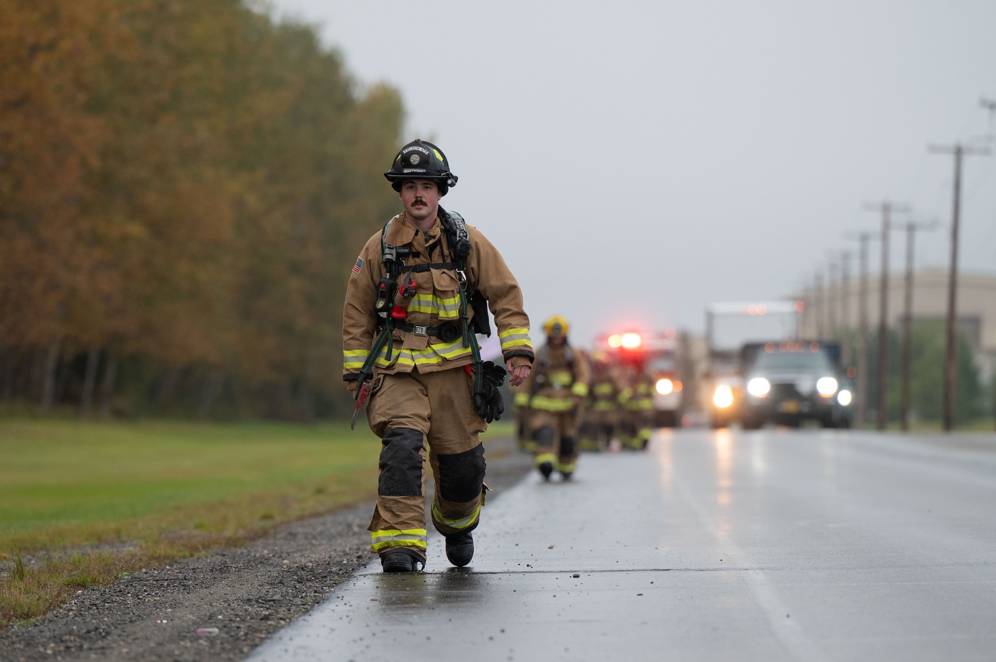 U.S. Senior Airman Hunter Miller, 354th Civil Engineer Squadron firefighter, participates in a two-mile ruck following the 24th annual 9/11 Remembrance Ceremony at Eielson Air Force Base, Alaska, Sept. 11, 2025.